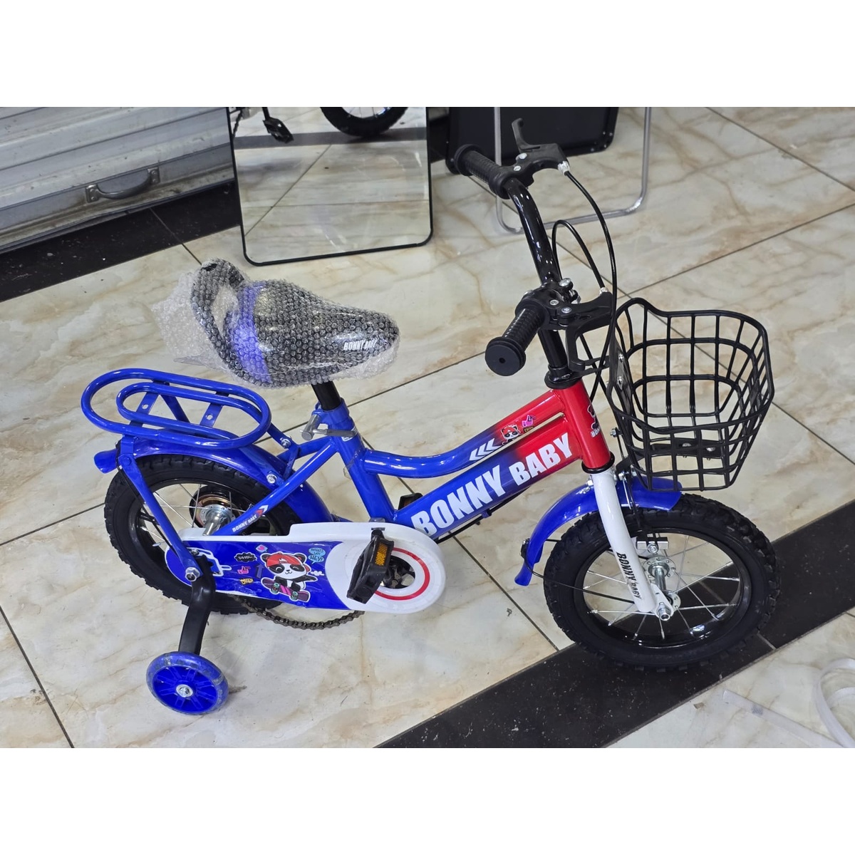 Bonny Baby Size 12 Kids Bicycle with training wheels and basket
